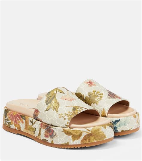 flowers gucci slides|Gucci floral platform slides.